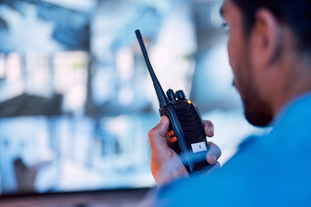 Person using a GMRS handheld radio